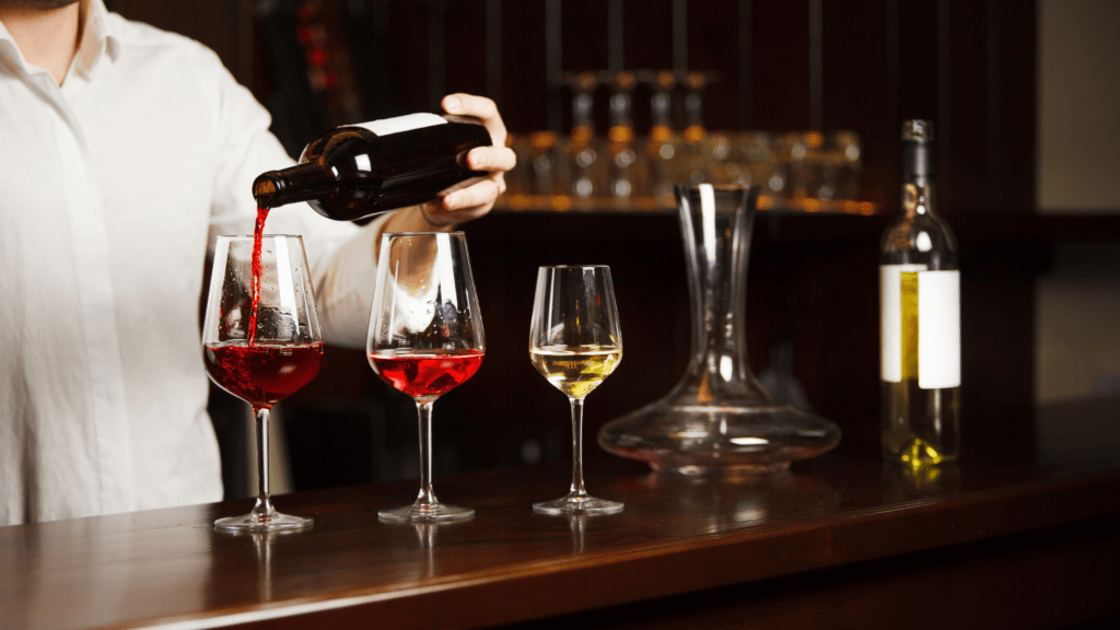 fine wine being poured into a glass